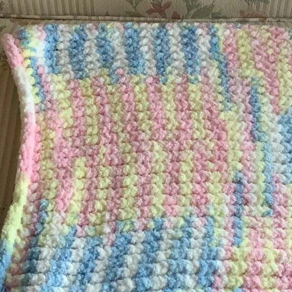 White handmade, multicolored, vibrant, soft, comfortable blanket